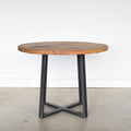  Round Criss Cross Base Dining Table in Reclaimed Oak / Clear and Blackened Metal Base