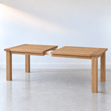 Breadboard Extendable Dining Table Pictured in White Oak Clear.