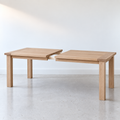 Breadboard Extendable Dining Table Pictured in White Oak Natural.