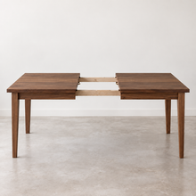 Extendable Slim Tapered Leg Dining Table Pictured in Walnut Clear - Leaf 