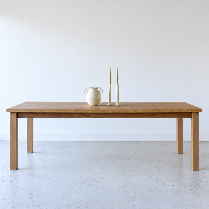 Farmhouse Extendable Dining Table, Parsons style Pictured In White Oak Clear.