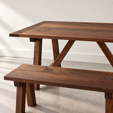 Farmhouse Trestle Dining Table Pictured In Walnut Clear Featured with our <a href="/products/trestle-wood-dining-bench">Trestle Wood Bench</a> in Walnut Clear