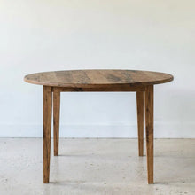Round Tapered Leg Dining Table Pictured in Reclaimed Oak Textured