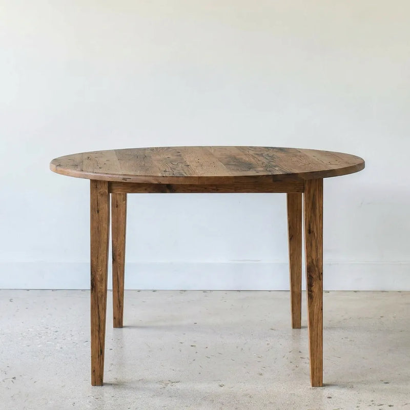 Round Tapered Leg Dining Table Pictured in Reclaimed Oak Textured