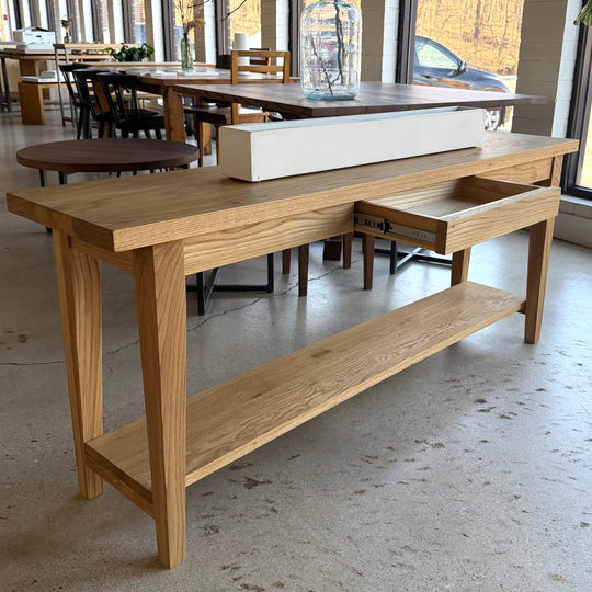 In Stock 68”L Tapered Leg Console Table with Hidden Drawer in White Oak Natural — Ready to Ship