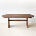 Modern Timber Oval Dining Table Pictured in Reclaimed Oak Walnut