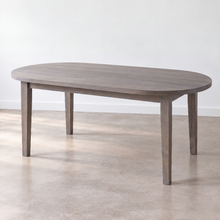 Oval Tapered Leg Dining Table Pictured in White Oak Gray