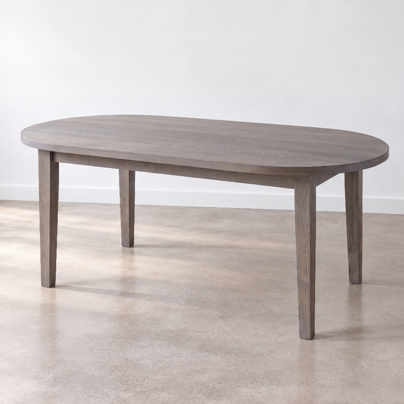 Oval Tapered Leg Dining Table Pictured in White Oak Gray
