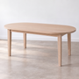 Oval Tapered Leg Dining Table Pictured in White Oak Natural