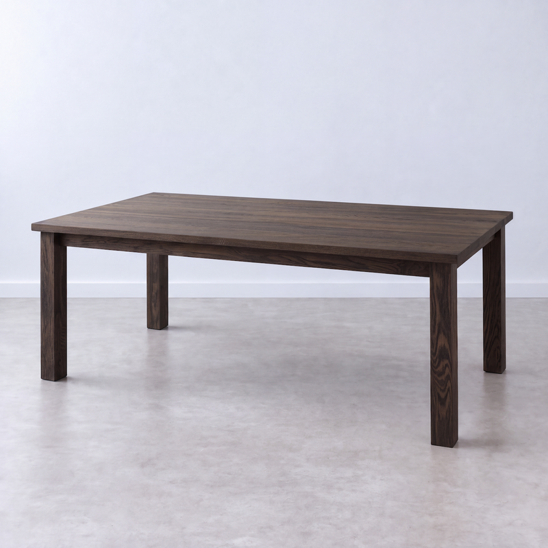Plank Farmhouse Dining Table Pictured in White Oak Black Finish
