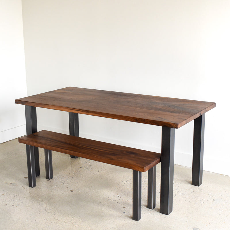 Industrial Post Leg Dining Table Pictured In Walnut Clear &amp; Blackened Metal Legs. Featured with our &lt;a href=&quot;https://wwmake.com/products/industrial-modern-reclaimed-wood-bench-u-shaped-metal-legs&quot;&gt; Industrial Post Leg Bench&lt;/a&gt; 