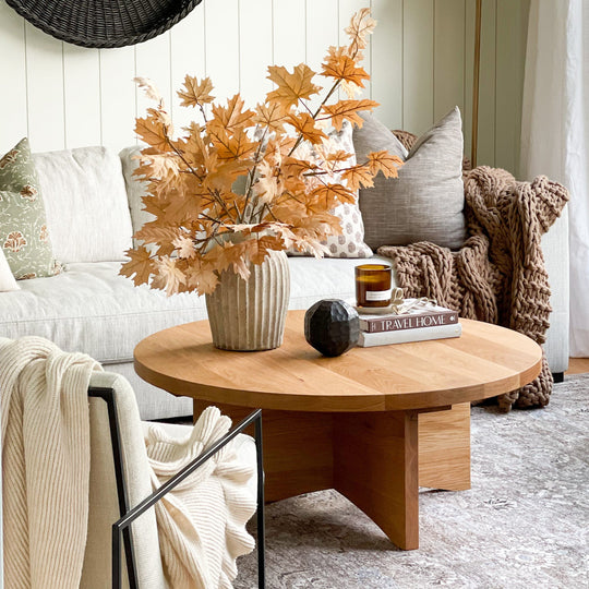 Sculptural Round Wood Coffee Table Pictured in White Oak Clear. Styled in fall decor by home influencer Julie Baird.