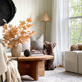 Sculptural Round Wood Coffee Table Pictured in White Oak Clear. Styled in fall decor by home influencer Julie Baird.
