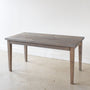 Slim Tapered Leg Dining Table Pictured in White Oak Gray