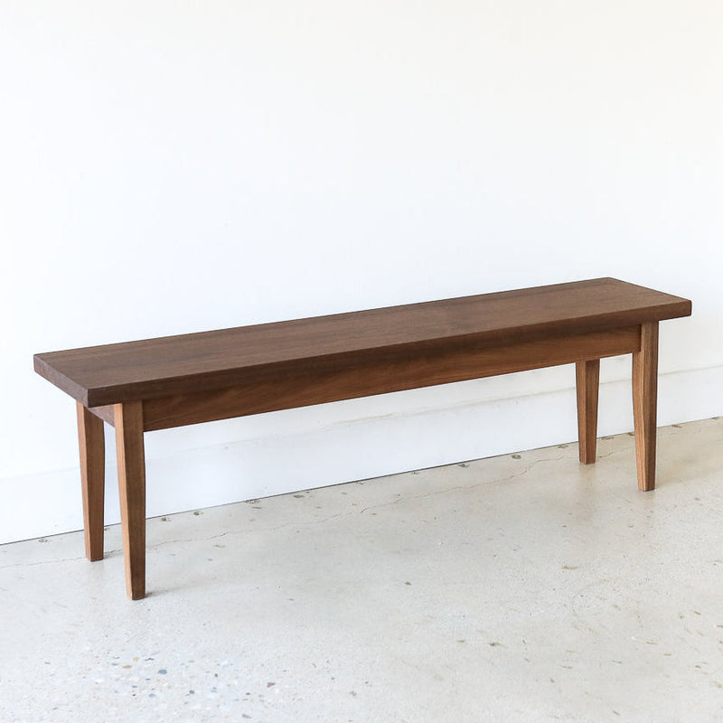 Tapered Leg Wood Bench Pictured In Walnut Clear