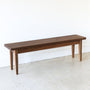 Tapered Leg Wood Bench Pictured In Walnut Clear
