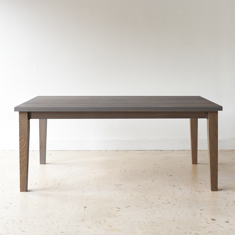 Plank Tapered Leg Dining Table pictured in White Oak Gray