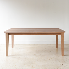Plank Tapered Leg Dining Table pictured in White Oak Natural