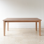 Plank Tapered Leg Dining Table pictured in White Oak Natural