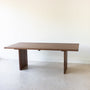 Rounded Corner Timber Dining Table Pictured in Walnut Clear