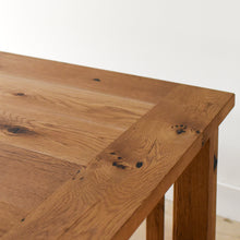 Detailed shot of reclaimed wood breadboard end. 