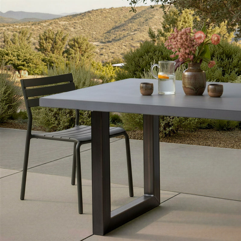 Industrial Modern Indoor/ Outdoor Concrete Dining Table Pictured in Gray Concrete and Blackened Metal