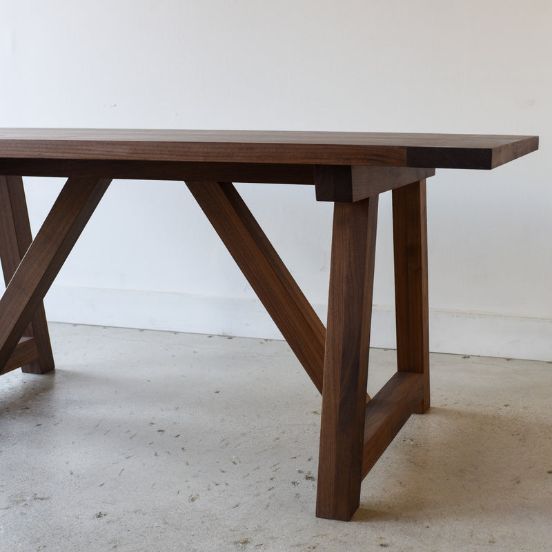 Farmhouse Trestle Dining Table Pictured In Walnut Clear