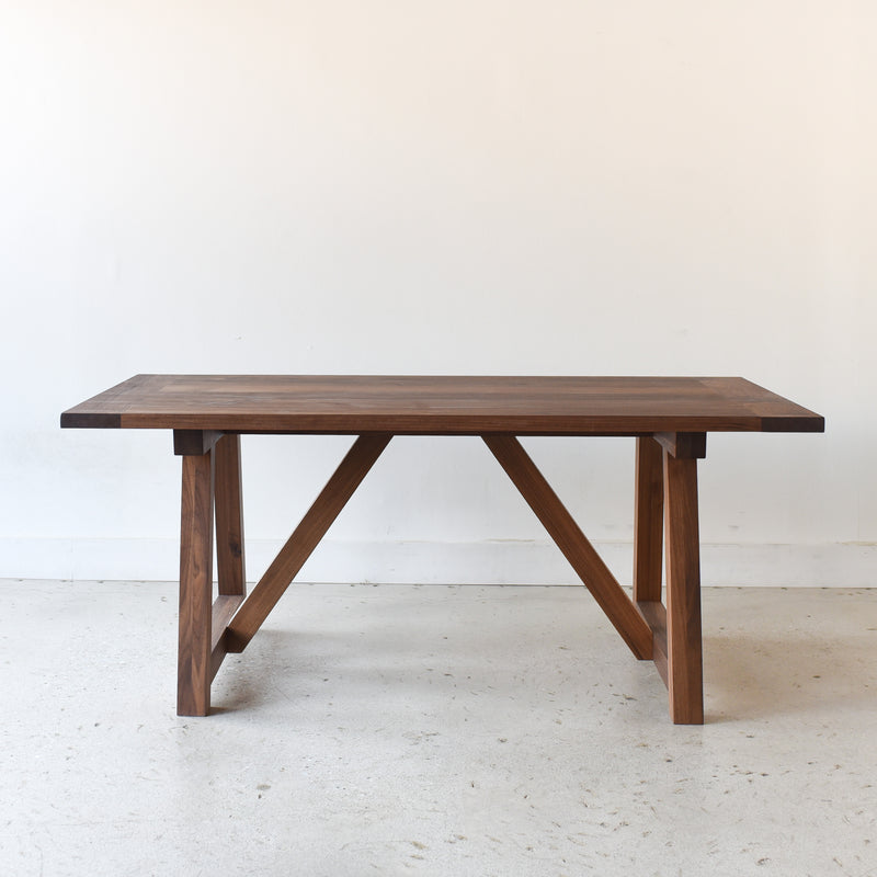 Farmhouse Trestle Dining Table Pictured In Walnut Clear