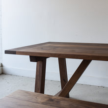 Farmhouse Trestle Dining Table Pictured In Walnut Clear Featured with our &lt;a href=&quot;/products/trestle-wood-dining-bench&quot;&gt;Trestle Wood Bench&lt;/a&gt; in Walnut Clear