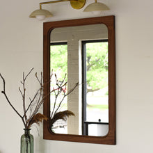 Frances solid wood wall mirror pictured in Walnut Clear with rounded corners, handcrafted by Hans Studio