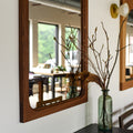 Handcrafted hardwood mirror with soft rounded edges and architectural frame design
