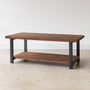 Industrial Modern Coffee Table With Lower Shelf Pictured In Walnut Clear Blackened Metal 