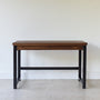 2-Drawer Modern Wood + Metal Desk Pictured in Walnut Clear and Blackened Metal