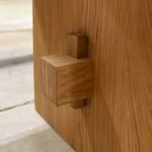 Close-up of a wooden joinery on our Modern Timber Frame Dining Table. Pictured in White Oak Clear.