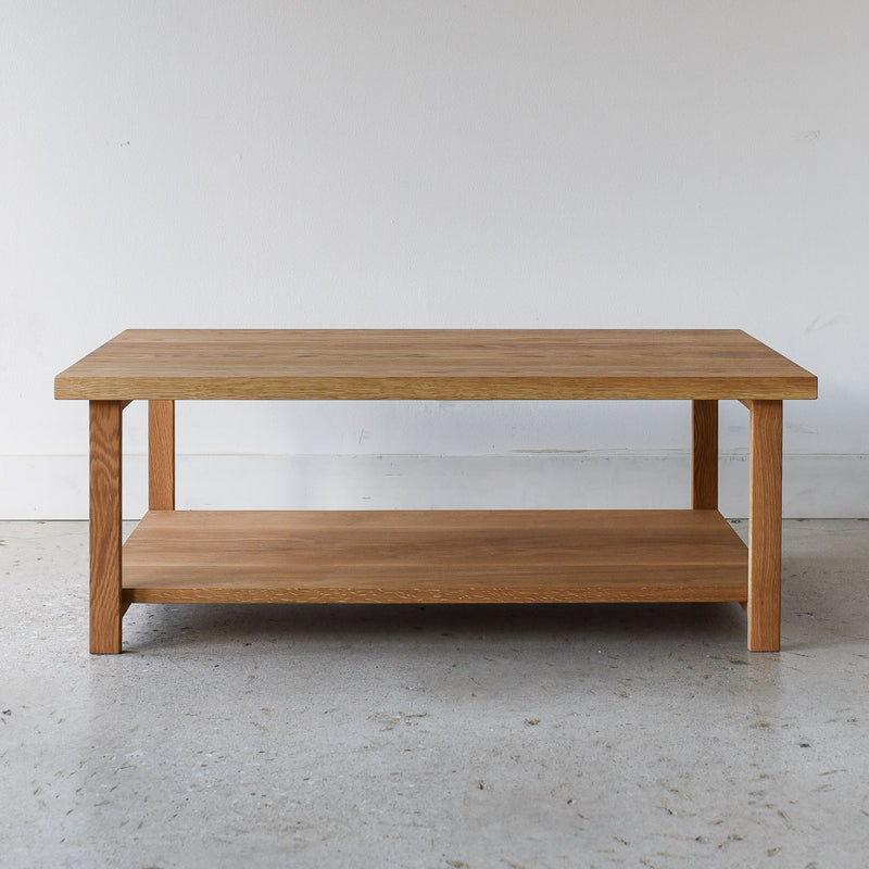 Modern Solid Wood Coffee Table With Lower Shelf Pictured in White Oak / Clear