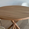 A lovely customer's home featuring  our Round Solid Wood Pedestal dining table.