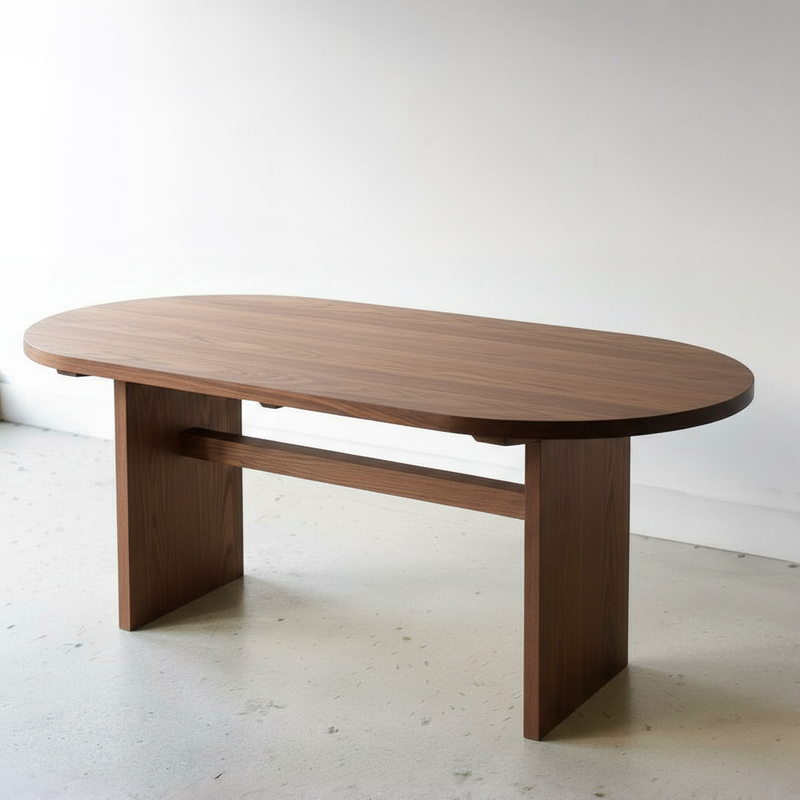 Modern Timber Oval Dining Table Pictured In Walnut Clear