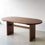 Modern Timber Oval Dining Table Pictured In Walnut Clear