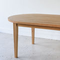 Showcasing the slim tapered leg on our white oak clear finish.