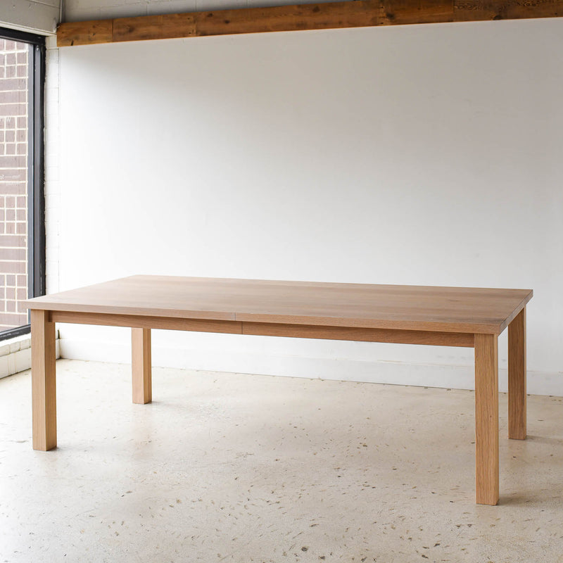 Plank Farmhouse Dining Table Pictured In White Oak Natural