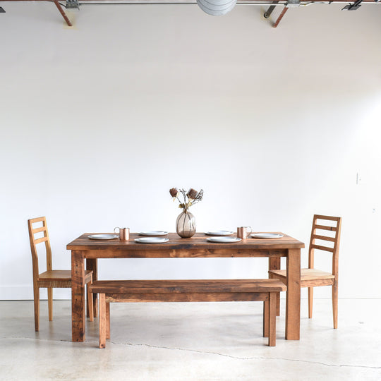 Plank Farmhouse Dining Table Pictured in Reclaimed Oak Textured Finish, Featured with our Farmhouse Wood Dining Chairs in Mixed Woods. Featured with our   Farmhouse Dining Chair also Featured with our  Farmhouse Wood Bench  in Reclaimed Oak / Textured Finish