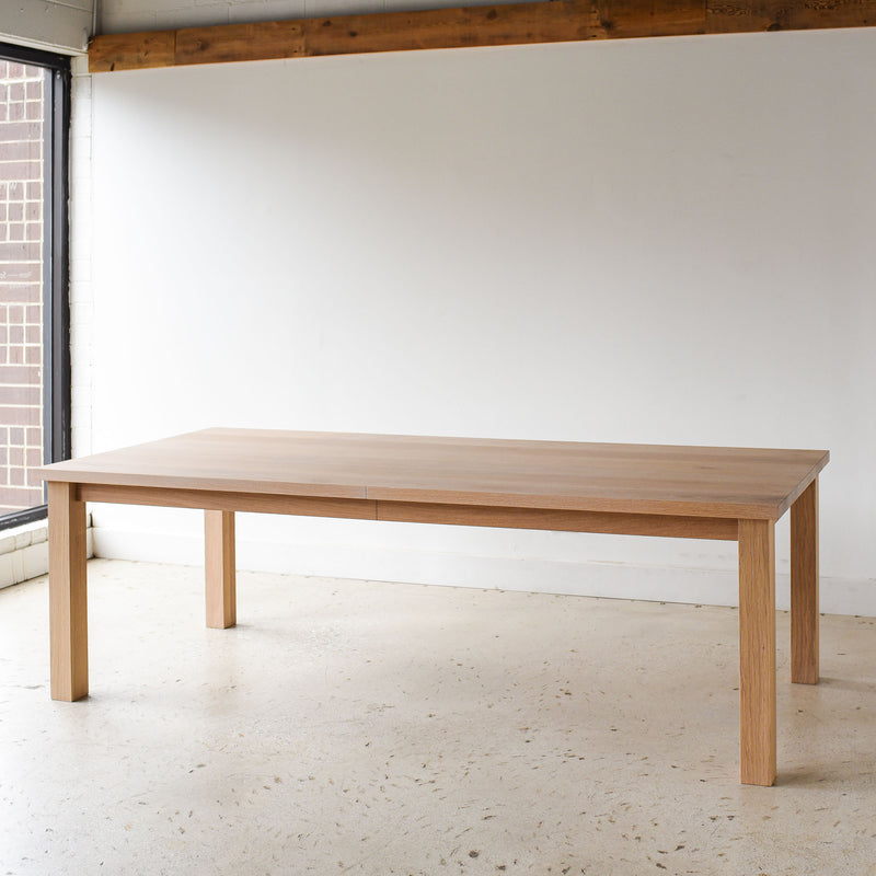 Farmhouse Extendable Dining Table Pictured In White Oak Natural