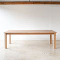 Farmhouse Extendable Dining Table Pictured In White Oak Natural.