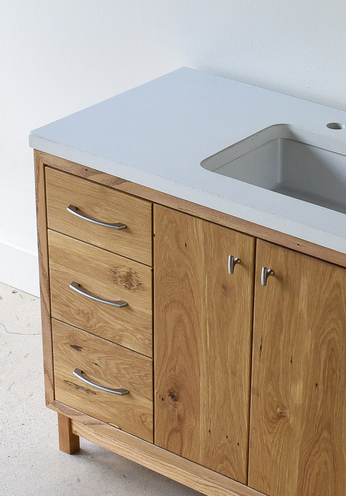 Pictured in White Oak/ Clear with Routed Finger Pull & White Concrete Top