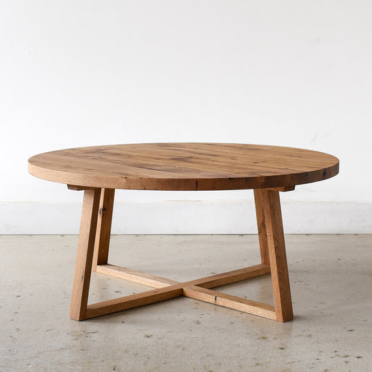 Round Solid Wood Coffee Table Pictured in Reclaimed Oak / Clear