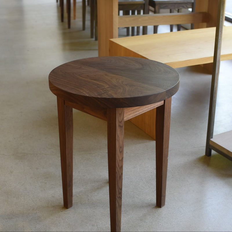 Round Taper Leg Accent Table Pictured In Walnut Clear