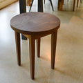 Round Taper Leg Accent Table Pictured In Walnut Clear