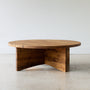 Sculptural Round Wood Coffee Table Pictured in Reclaimed Oak / Clear