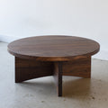 Sculptural Round Wood Coffee Table Pictured in Walnut / Clear