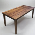 Slim Tapered Leg Dining Table Pictured in Walnut Clear